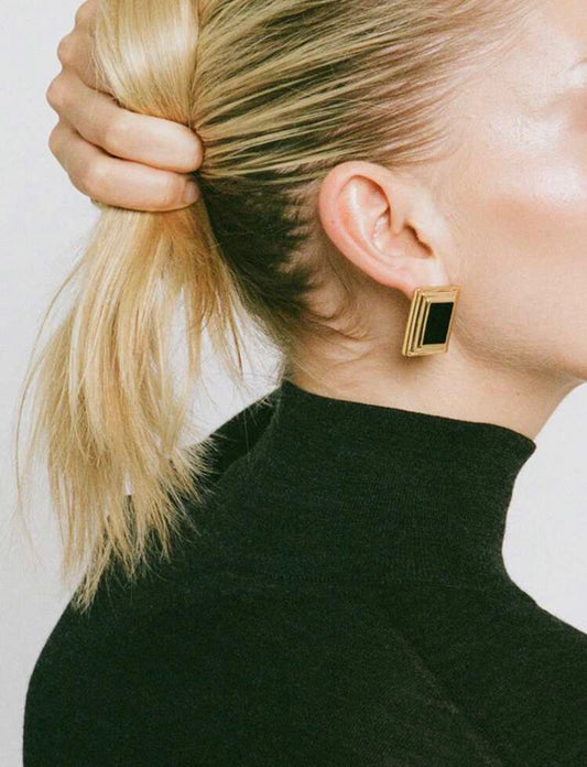 Nera Earrings – gold stepped frame stud earrings with a glossy black centre by ISHEEM